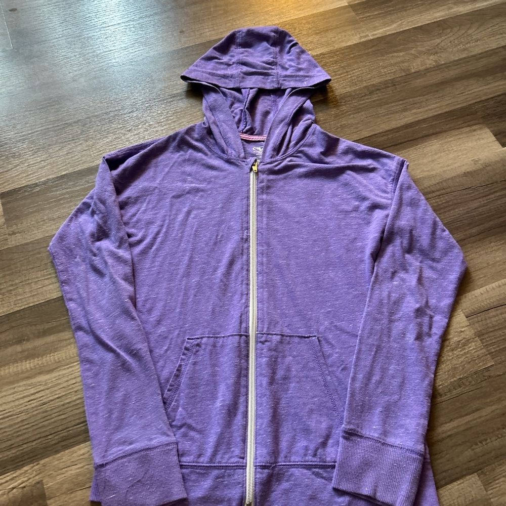 Form fitting purple zip up hoodie with thumb holes
